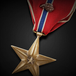 Bronze Star Medal (First Oak Leaf Cluster)